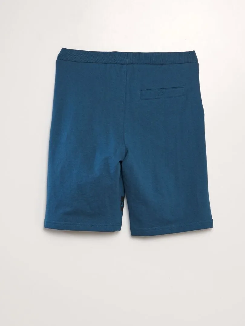 BERMUDAS DE CHáNDAL CON INSCRIPCIóN  AZUL