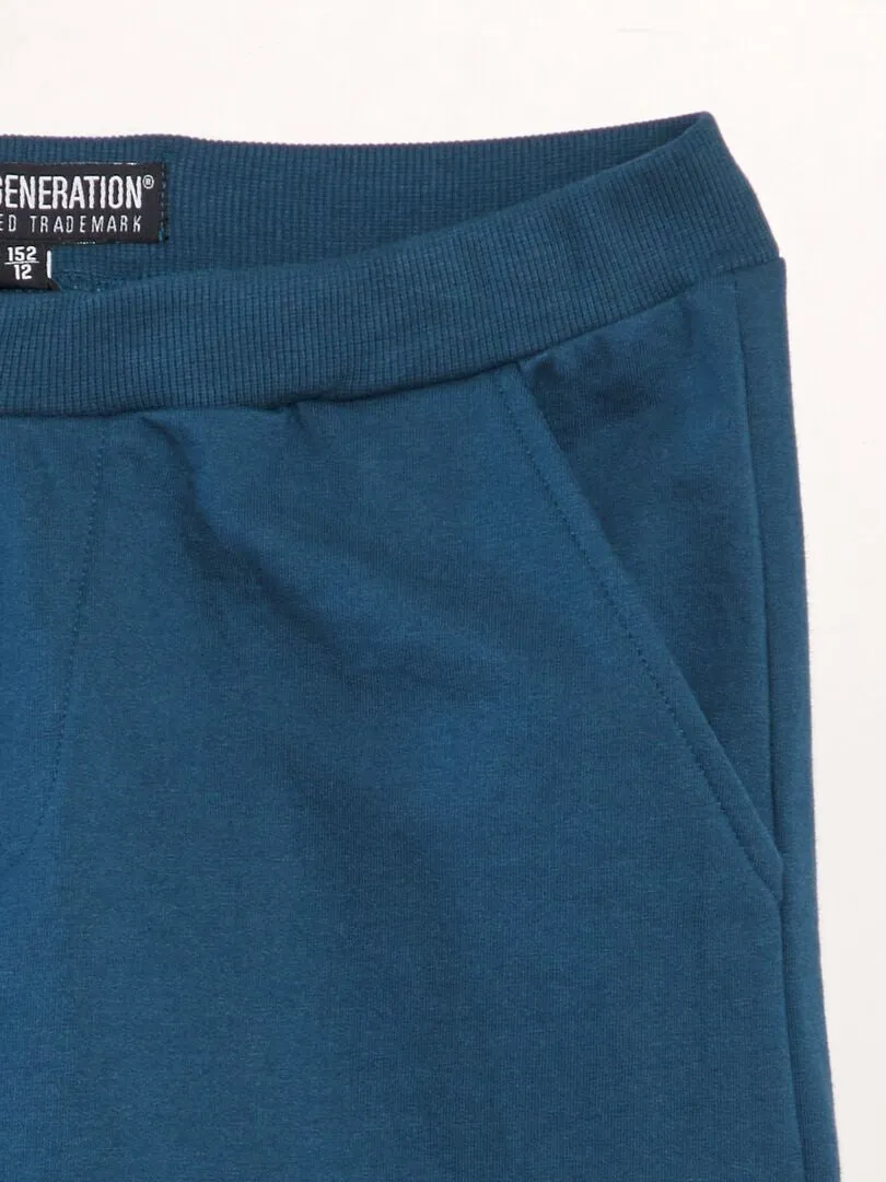 BERMUDAS DE CHáNDAL CON INSCRIPCIóN  AZUL