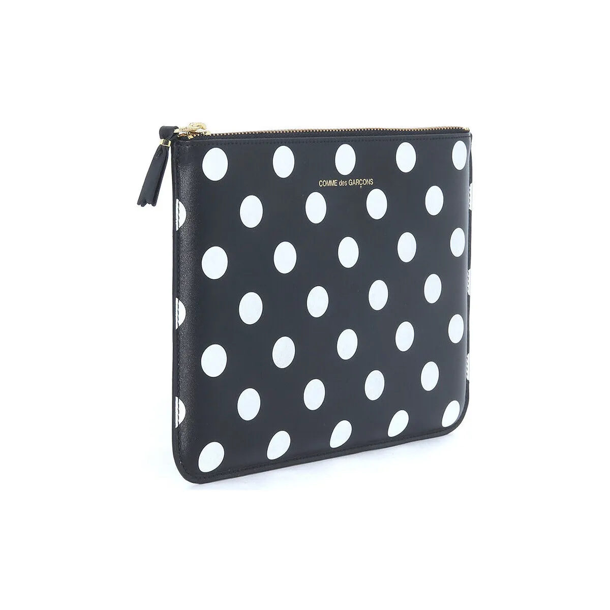 Bolso de mano Comme des Garçons en piel negra con lunares