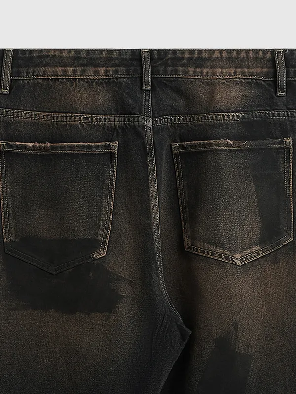Jeans sueltos de piernas anchas teñidos con barro pintados a mano