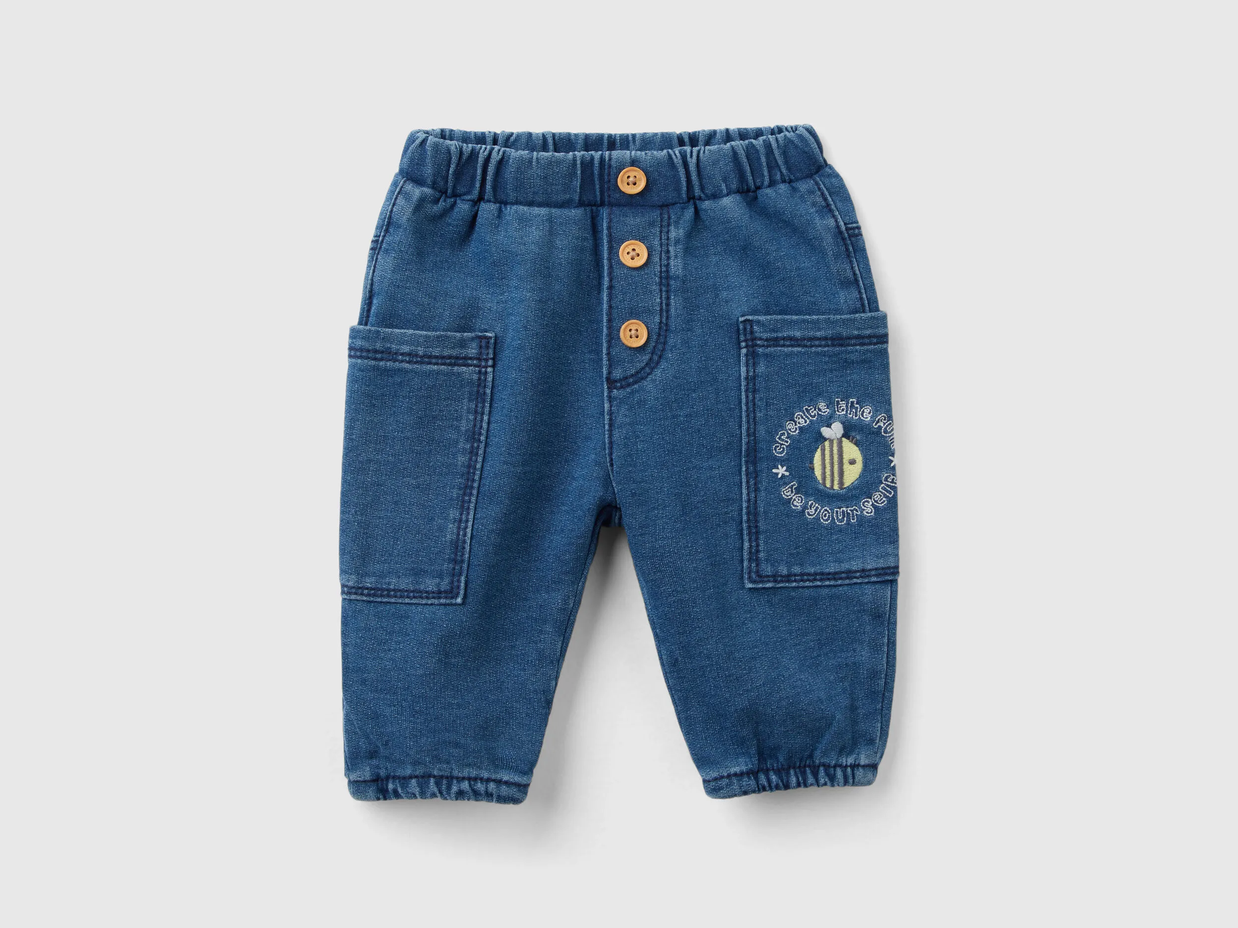 Pantalón con bolsillos de felpa efecto denim