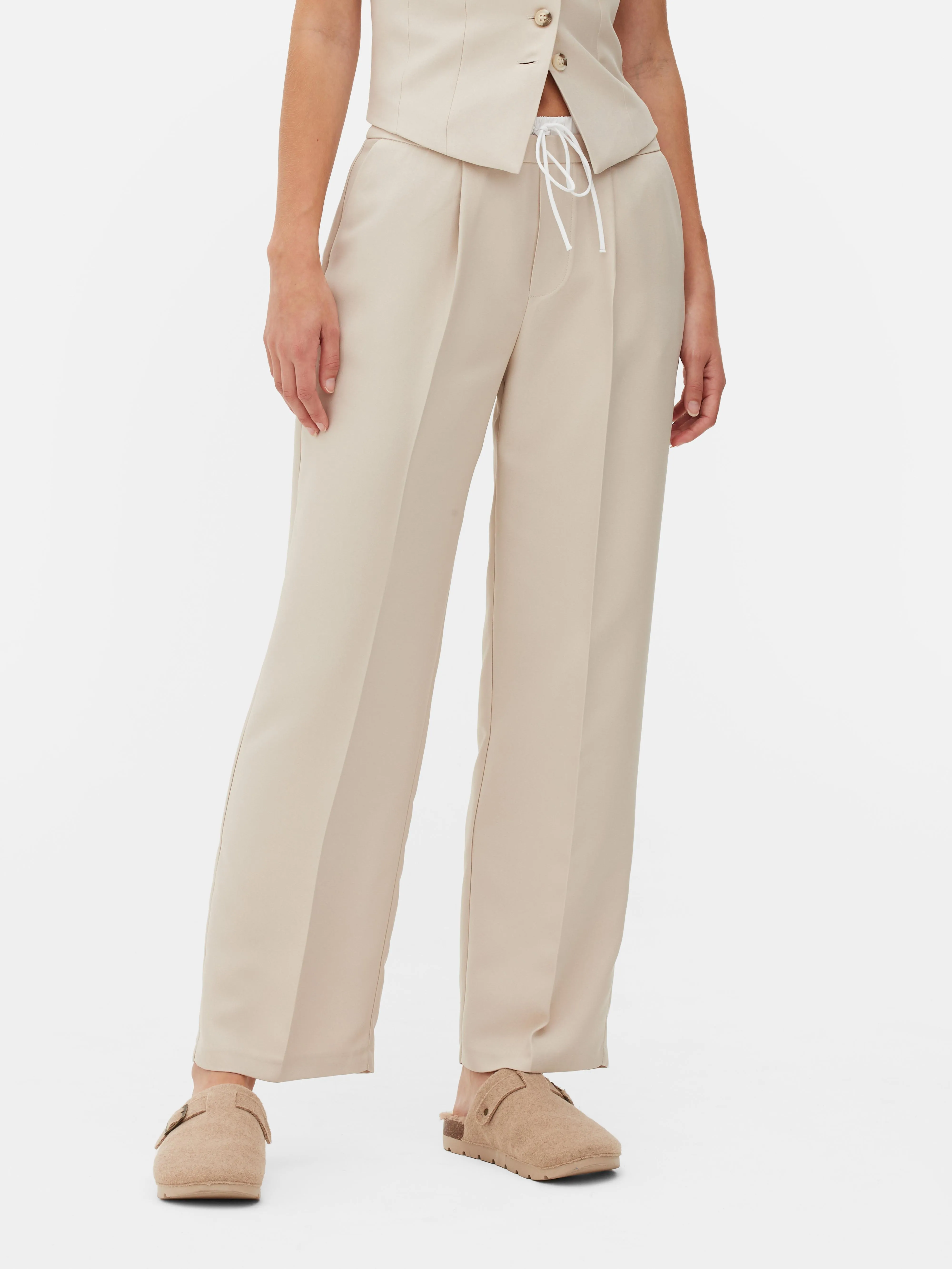 Pantalones rectos con cordón de ajuste