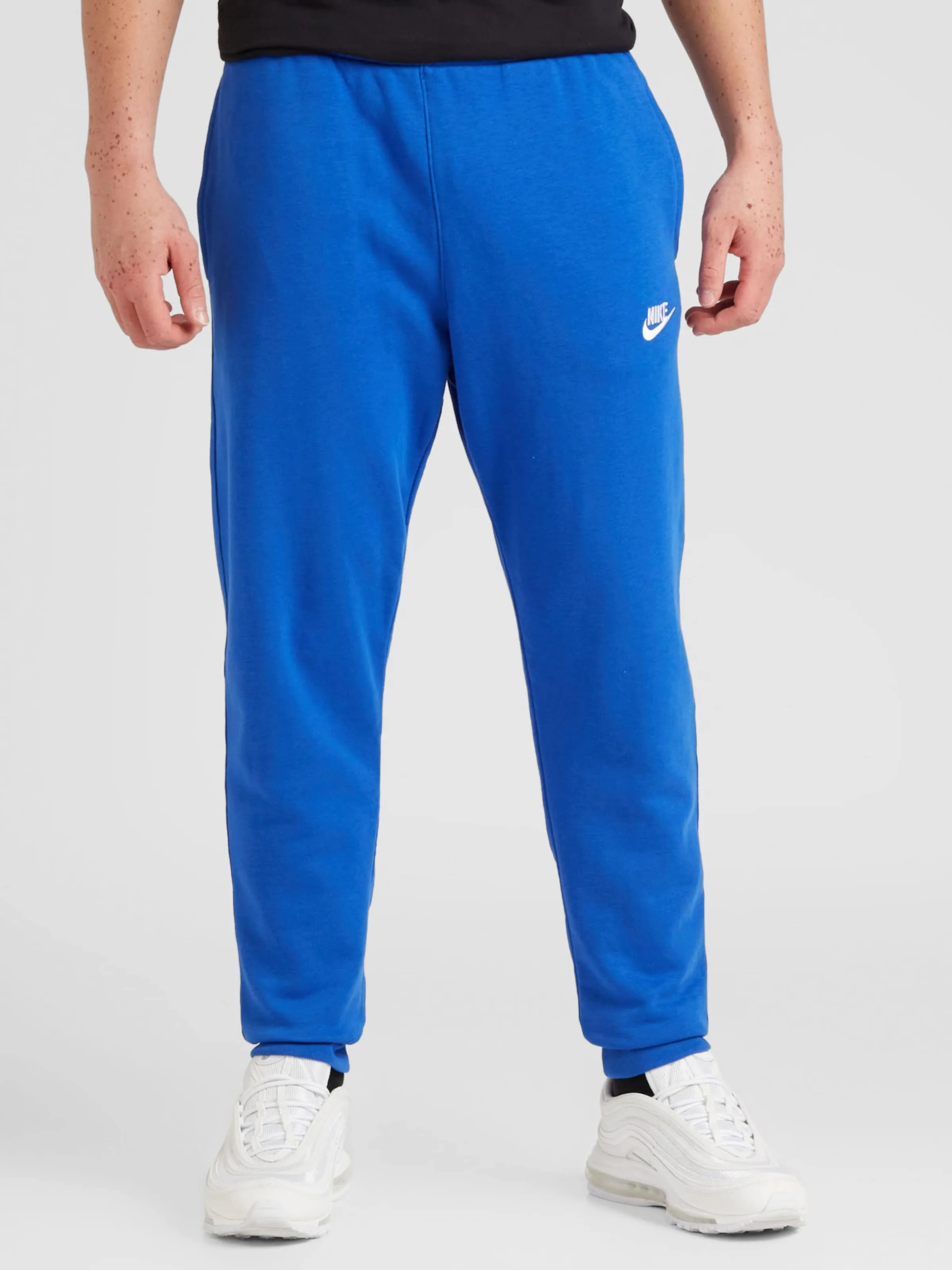 Tapered Pantalón Nike Sportswear en Azul Real